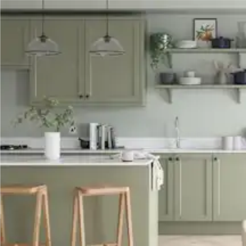 Occupied kitchen cleaning with appliance 